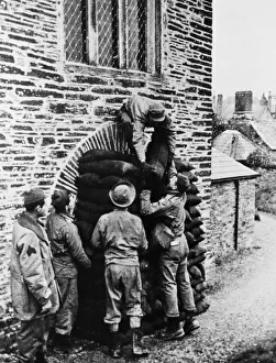 01224 Prints: US troops can be seen here in the village Blackawton helping to protect buildings