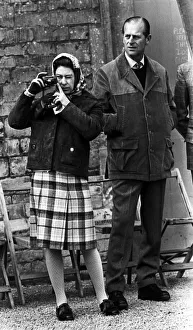 Head Scarf Prints: Tthe Queen with Prince Philip, taking picture at Badminton Horse Trials