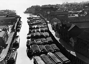 Tugs Prints: Tugs, lighters and barges moored to the staithes awaiting to unload their goods into