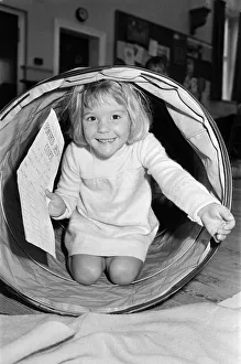Money Prints: Tunnelling for sponsorship cash is four-year old Helen Copley who took part in an