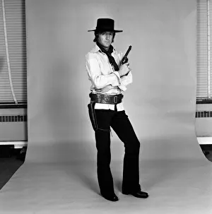 TV personality Michael Parkinson dressed in cowboy attire. 28th September 1972