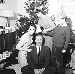 Christmas Tree Prints: Tv presenter Hughie Green seen here at home at Christmas time with his family