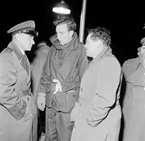 Waterproofs Prints: TV presenter Raymond Baxter seen here boarding the Goodwin lightship 23rd November 1956