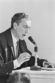 TV Presenter Raymond Baxter seen here commentating at a British Motor Corporation motor