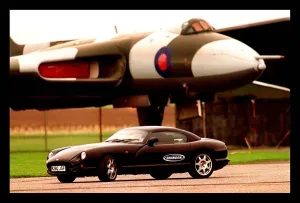Vehicles And Transport Prints: TVR Cerbera car February 1998 underneath plane Brandon