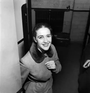 Twenty-one year old Audrey Freeman singing and dancing college girl