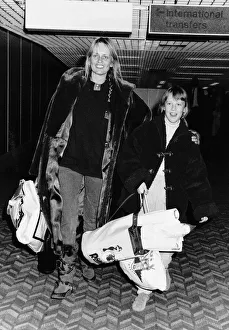 Twiggy Model Actress arriving at Heathrow Airport airport with daughter Carly