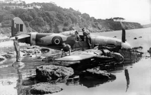Rocks Prints: A Typhoon makes a pancake landing, on the edge of a rock strewn shore near Torquay in