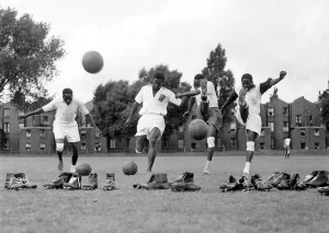 Practice Prints: Uganda football team in training at Paddington recreation ground. 24th August 1956