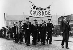 Manchester Collection: Unemployment Jarrow Marchers men in uniform carrying a banner reading