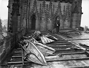 Waistcoat Prints: Unidentified gentleman seen here inspecting the damage to the roof of St Michael