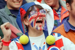 Patriotic Prints: A Union Jack Face Painted fan of Tim Henman support the English tennis player during his