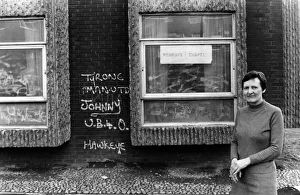 Vandalism Prints: United Reform minister Patricia Parrish looks at some of the graffiti on the walls at her