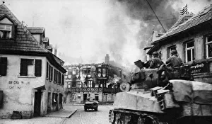 Burning Prints: Units of General Pattons 11th Armoured Division drive through Kronach, Germany