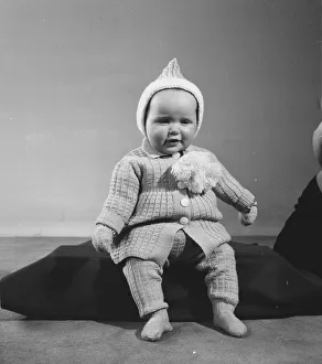 00112 Prints: Unknown child model seen here modelling one of the years Reveille knitwear outfits