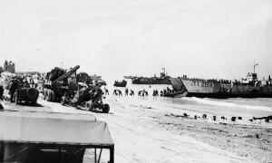 D Day Prints: Unloading equipment on the beaches of Normandy on June 24th from various craft was in