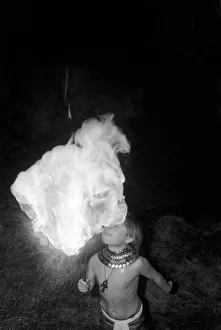 Dangerous Prints: Unusual: Children. Fire Eater. 9 year old Tony Walls. Tony spitting a ball of flame