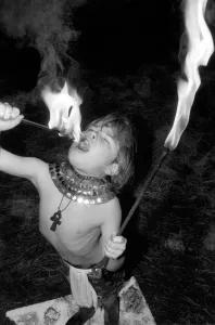 Unusual: Children. Fire Eater. 9 year old Tony Walls. Tony at his Fire Swallowing Act