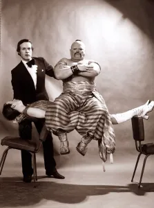 Unusual - Magic Magician Hypnoist Romark performing a trick where his assistant floats