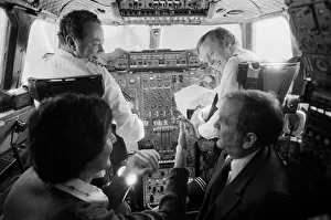 Uri Geller at London Airport pictured in the cockpit of a Concorde. 1st November 1978