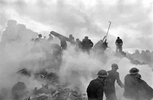 V1 flying bomb falls on dwelling houses and shops somewhere in Southern England