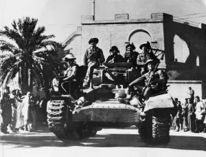 01462 Prints: Valentine tanks pass cheering civilians in Tripoli during the Second World War