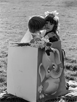 00104 Prints: Valentines Day Card and Kiss Children Feb 1975 Joanne Valentine 3 holding flowers