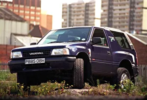 VAUXHALL FRONTERA SPORTs parked on rough ground dark blue