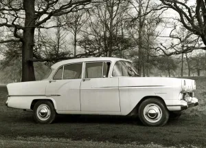 Vauxhall Victor Parked in woodland roadside surrounded by trees Styled like