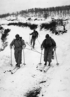 Skiing Prints: Vehicles tried unsuccessfully to get through to an isolated British outpost in Italy
