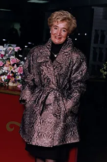 Vera Weisfeld in mock crock mini mac from new Weisfeld range of ladieswear