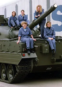 00494 Prints: Five of Vickers female apprentices on a vickers Mark 3 Tank on 5th March 1992