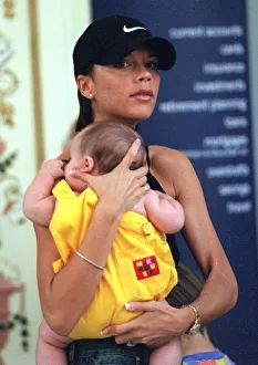 Nike Prints: Victoria Adams ('Posh Spice') out shopping with baby Brooklyn in Trafford