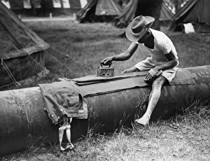 Ironing Prints: Victory March preparations. June 1946 The Seargant Major of the East African Rifles