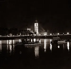 00089 Prints: View of Big ben and the Houses of Parliament and New Scotland Yard lit up at night
