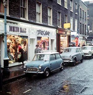 View of Carnaby Street, London. Trendy boutiques including Domino Male