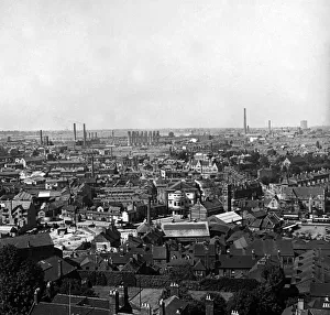View of Coventry rooftops looking towards the construction of Trinity Street as seen