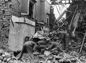 Rubble Prints: View of the damage to to Mark Street, Cardiff following an air raid by bombers German