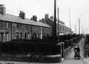 View of a street in Durham, showing a row of houses where miners live May 1936