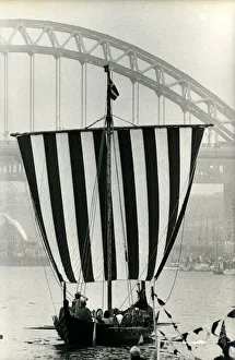Hobbies Prints: A Viking long boat coming up to the Tyne Bridge on the river Tyne on 26th July 1980
