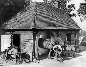 Rural Scene Prints: The village blacksmith pursuing his ancient craft in the picturesque village of Claverdon