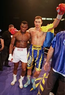 Images Dated 26th June 1999: Vitali klitschko with arm around Herbie Hide after knocking him out in two rounds to take