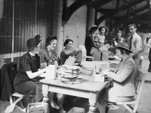 Voluntary workers seen here assembling gas mask boxes at the Broad Street offices of