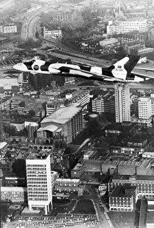 Plane Prints: Vulcan Delta bomber NQJ swoops spectacularly over the city of Coventry as a thank you to