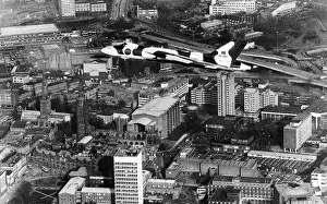 00503 Prints: Vulcan Delta bomber NQJ swoops spectacularly over the city of Coventry as a thank you to