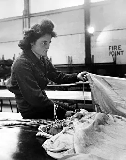 Parachute Prints: W. A. A. Fs. at Upper Heyford R. A. F. Camp have now packed over half a million parachutes