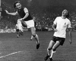 W. Ham v Spurs. Lampard puts over a centre leaving Gilzean gasping