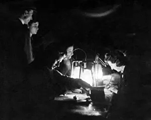 A W. V. S. incident enquiry. Working by the light of Hurricane lamps tense people still