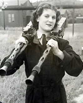 Waaf Prints: WaF with a couple of Browning machine-guns perched on her shoulders