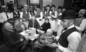 00098 Prints: The waiters had a dual role at the Victorian evening presented by Warwick Lions